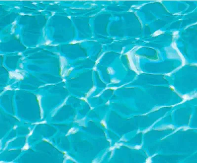A Leisure Pools fiberglass inground swimming pool in Aquamarine color