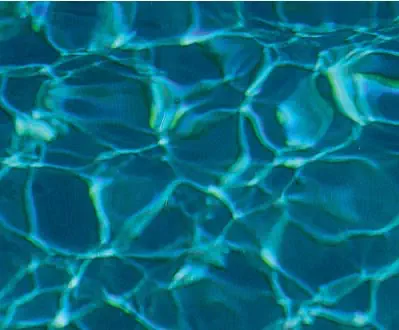 A Leisure Pools fiberglass inground swimming pool in Ebony Blue color