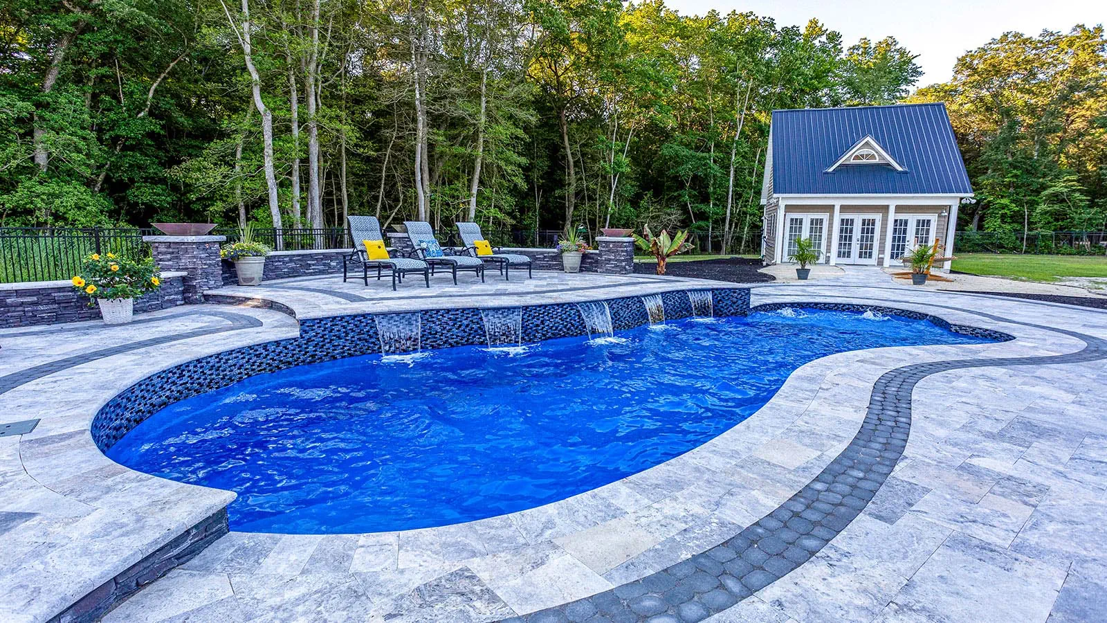 A Leisure Pools fiberglass pool in Sapphire Blue color