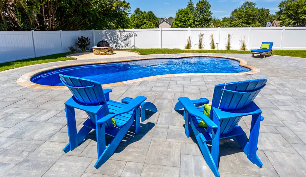 The Elegance fiberglass pool design by Leisure Pools in Sapphire Blue